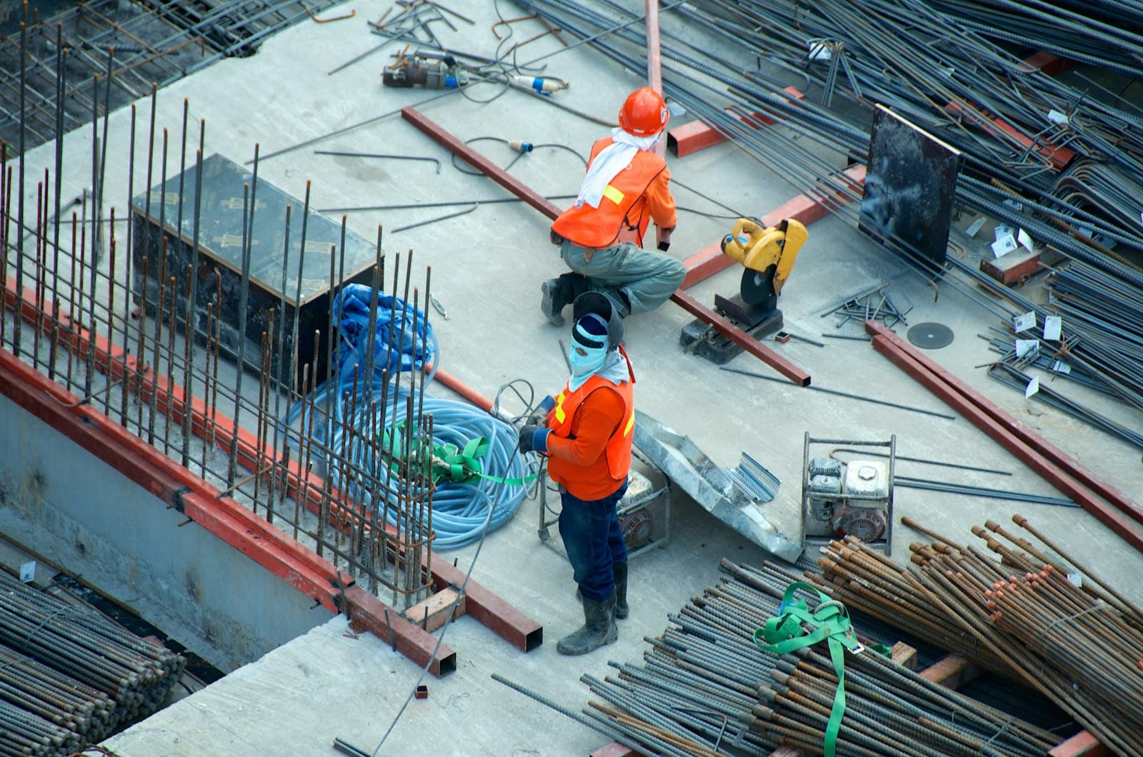 Construction professionals coordinating work on a premium building site